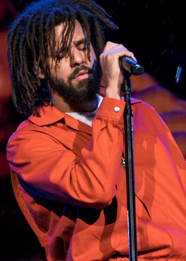 Rapper J. Cole, now a member of the Rwanda Patriots Basketball Club. 