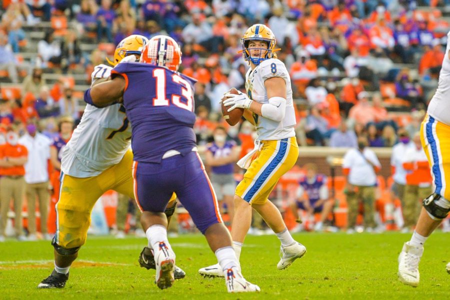 Pittsburgh QB Kenny Pickett (8) dropping back to pass against Clemson. 