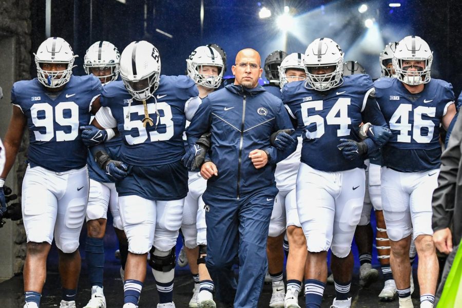Coach+James+Franklin+leading+his+Penn+State+team+out+of+the+tunnel+before+a+2021+game.
