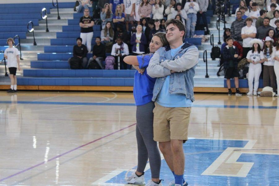 Nicole McCloskey and Jeff LaRuffa pose following their introductory performance as a part of the Homecoming Court.
