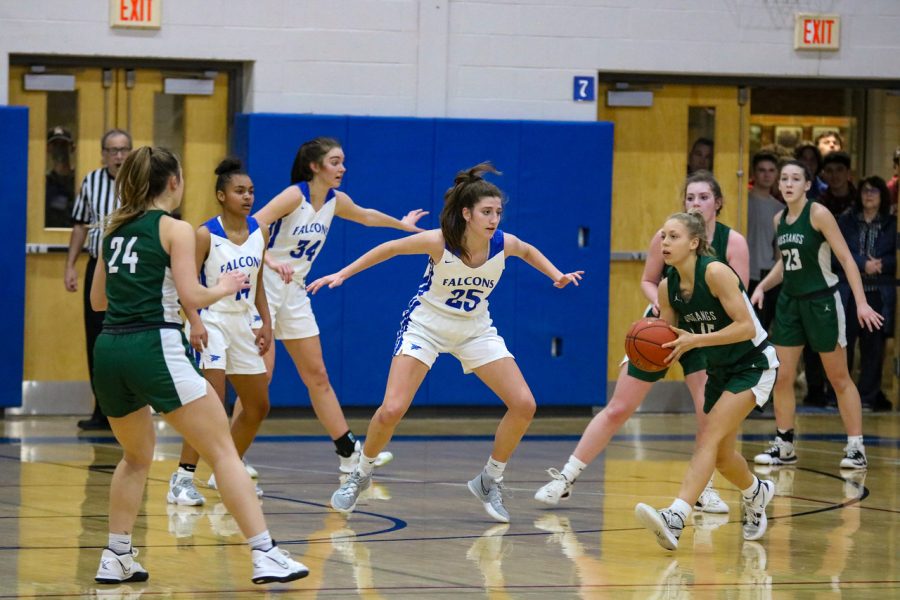 Wahlers guarding a West Perry player in last years district playoffs.