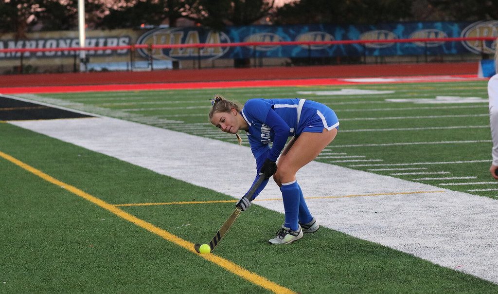 Senior Bridget Lawn passing the ball forward in the 2022 PIAA Class AAA State Championship. The Falcons claimed the title in overtime by a score of 3-2.