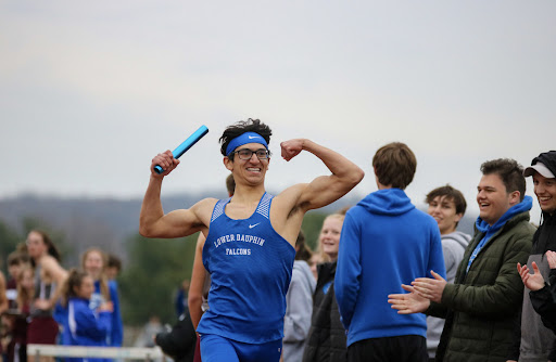 Senior Alex Garcia celebrating after finishing his race. Garcia will attend the University of Vermont this fall.