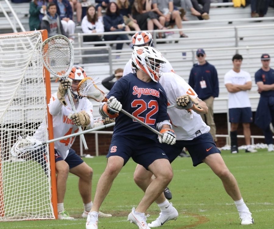 Syracuse freshman Joey Spallina dodging in an Apr. 22 game against Virginia. Spallina had two assists in a 19-12 loss to the Cavaliers.