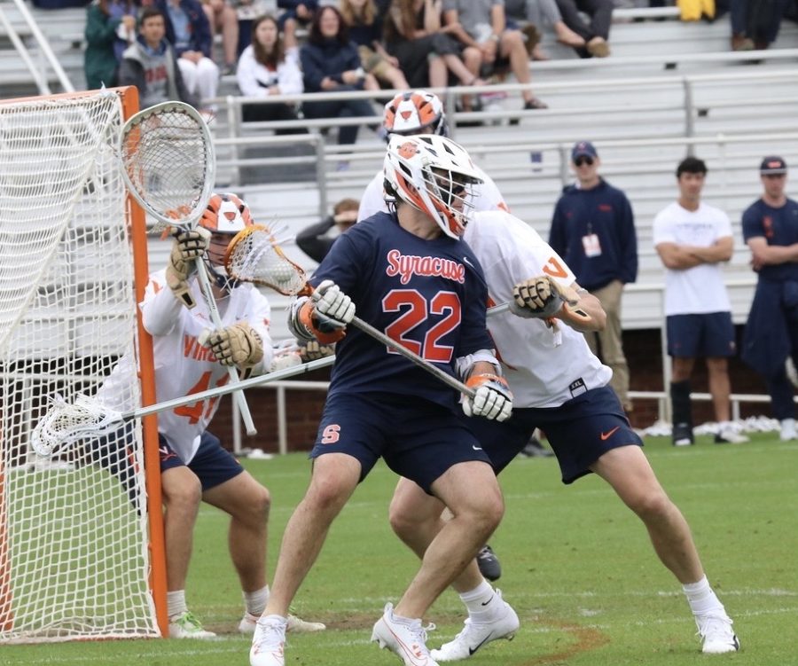 Syracuse+freshman+Joey+Spallina+dodging+in+an+Apr.+22+game+against+Virginia.+Spallina+had+two+assists+in+a+19-12+loss+to+the+Cavaliers.