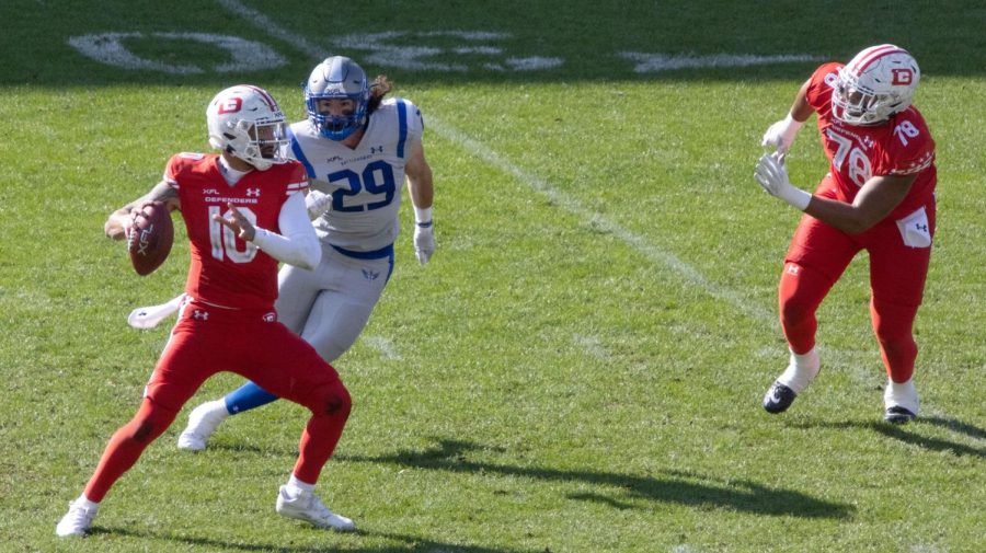 D.C. Defenders quarterback Jordan Taamu going through his reads to make a pass downfield. Taamu guided the Defenders to an 8-1 record through nine regular season games.