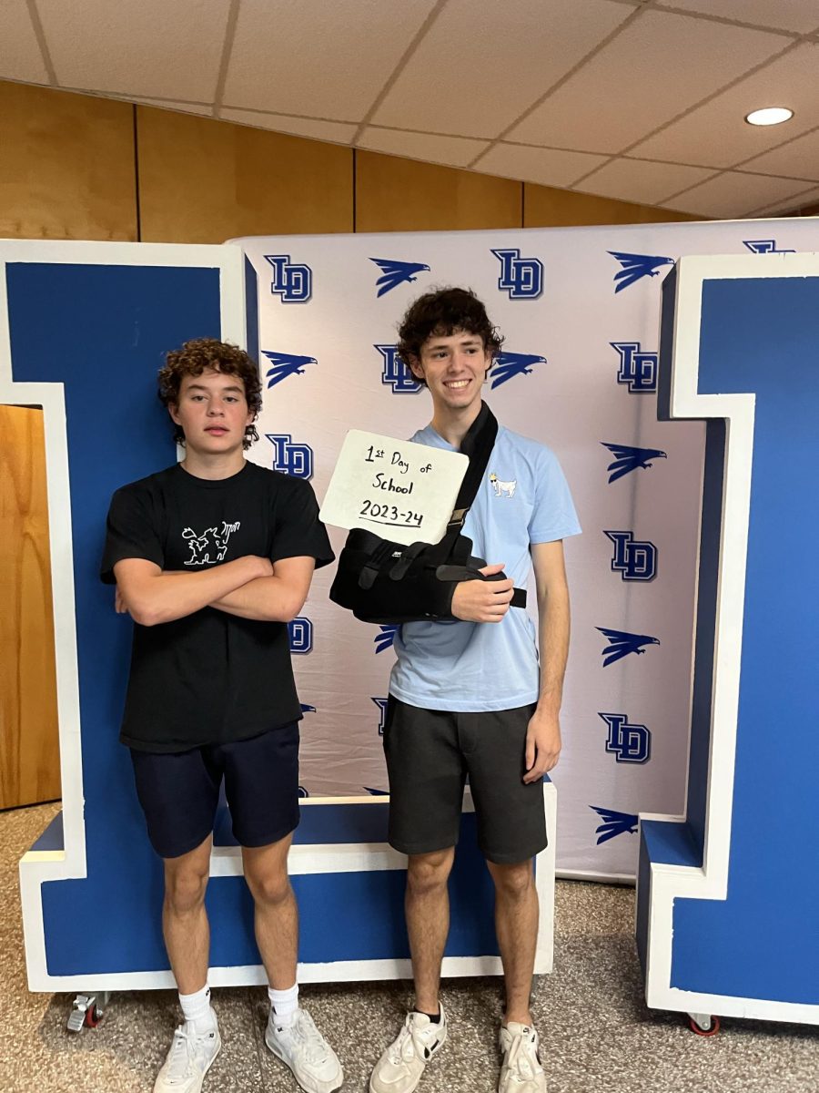 Seniors Quinn Madden (left) and Peter Otto (right), the winners of the Falcon Flash Back to School Photo Contest.