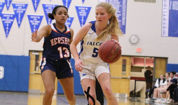 Lower Dauphin junior guard Janae Swartz dribbles past a Hershey defender in a 2023 game. Swartzs five steals and six points were crucial in LDs shock win over ELCO Monday, Feb. 6.