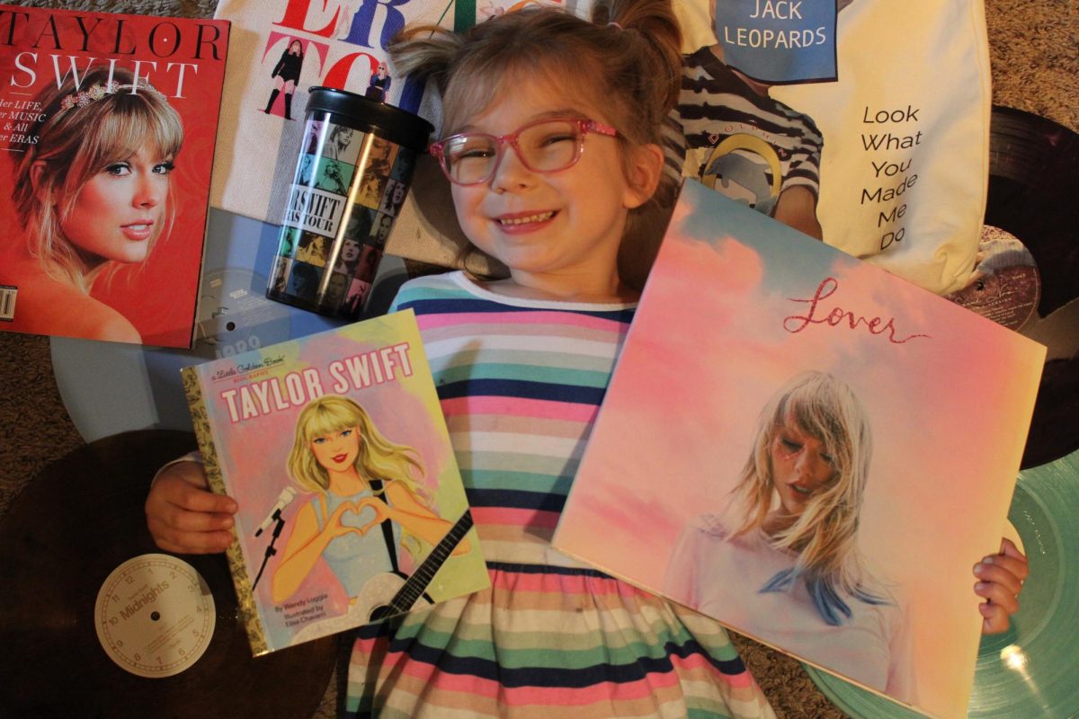 Linn pictured with some Taylor Swift merch.