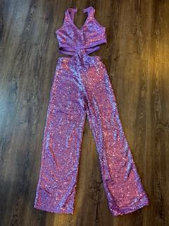 This sequin jumper is from a local dance studios production of "Mamma Mia". This specific costume was used for the song "Take a chance on me", a fun upbeat tap number!