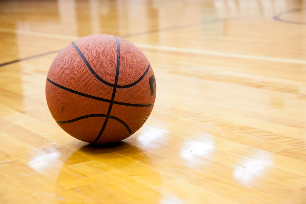 Basketball on court. Mini-THON is holding their annual student vs. teacher basketball game February 19th.