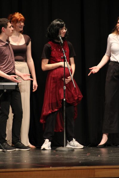 Caden S. announcing his fake pregnancy at Dramapalooza 13